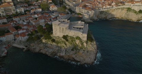 Aerial 5K Flyover Ocean And Historic Cliffside Fort Lovrijenac In Dubrovnik, Croatia