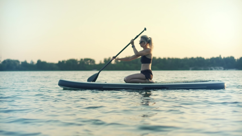 Stand Up Sport Recreation Paddle Boarding. Summer Beach Paddleboarder Sup Vacation.Travel Paddles Paddleboard.Sup Board Journey.Relaxing Sup Surf Swimming. Watersport Sport Recreation Sunset Surfboard Royalty-Free Stock Footage #1090625731