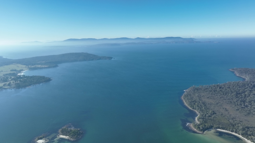 coastline next to bushland in tasmania australia