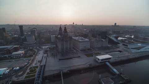 Establishing Aerial View Shot of Liverpool UK, Merseyside, England United Kingdom, slow track in, close to Royal Liver Building