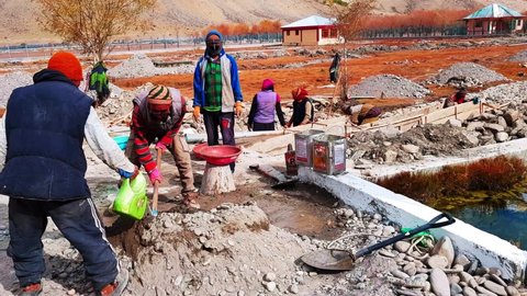 Leh, Ladakh, India-may 8 2022: Kargil labour are constructing water well.