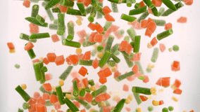 Corn, Carrots,Green Beans, Peas Falling into Water in Slow Motion on White Background. Mix of Fresh Vegetables Underwater. Healthy Organic Food, Air Bubbles. Macro - Powered by Shutterstock - Get 15% off with code: PIKWIZARD15