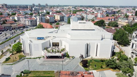 NOVI SAD, SERBIA - MAY 2022: "Srpsko Narodno Pozoriste" or Serbian National Theater building in Novi Sad. Aerial view.