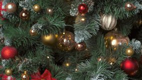 Christmas celebration holiday background - christmas tree decoration bauble ball on decorated Christmas tree, winter holidays conctp. Truck slider shot - Powered by Shutterstock - Get 15% off with code: PIKWIZARD15