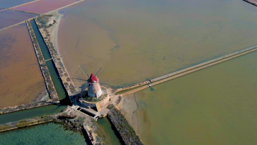Trapani windmills, Natural reserve of the Saline dello Stagnone, near Marsala and Trapani, Sicily., Aerial picture of Trapani salt evaporation ponds and salt mounds windmill 