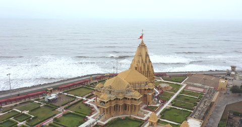 somnath , Gujarat , India - 05 23 2022: Somnath, Gujarat, India -: Beautiful aerial rotating shot over the Somnath Mahadev Temple, Gujarat, India. Somnath Mahadev Mandir is the oldest jyotirlinga of I