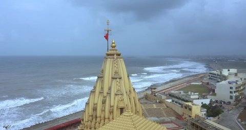 somnath , Gujarat , India - 05 23 2022: Aerial view of the Somnath temple located in Prabhas Patan, Veraval in Gujarat, India. One of the most sacred pilgrimage sites for the Hindus. One of the first 