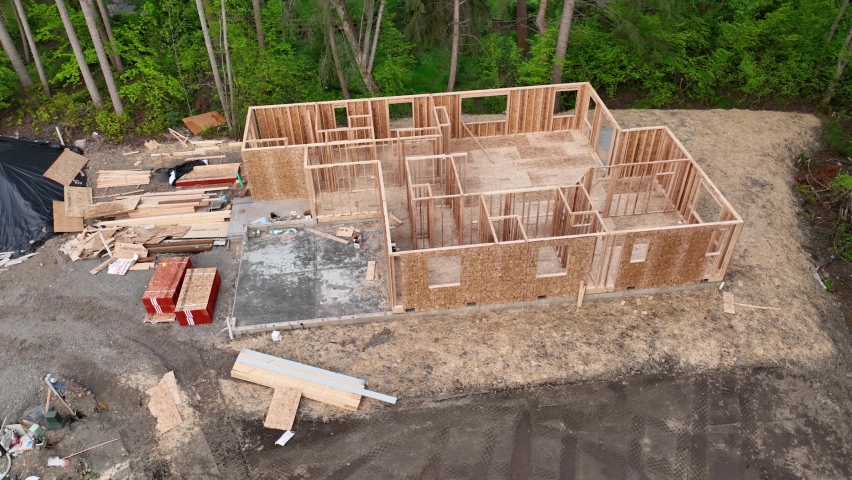 Rotating aerial overtop a frames single story house in an up and coming neighborhood.