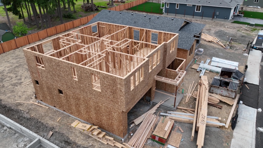 Orbiting aerial of a house under construction in one of America's newly developed neighborhoods.