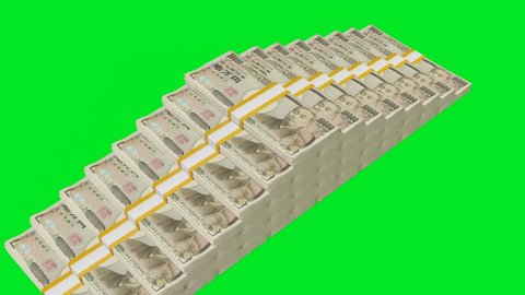 Many wads of money оп chromakey background. 10000 Japanese Yen banknotes. Stacks of money. Financial and business concept. 