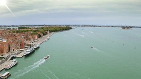 Aerial view of beautiful large water canal in Venice in old town of Italy ships italy city important tourist destination view from great height to attractions busy port of Italy scenic video quay