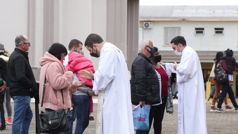 Farroupilha, Rio Grande do Sul, Brazil - 26th May, 2022: Catholic priests bless pilgrims of Our Lady of Caravaggio