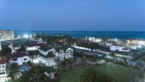 4k Timelapse video of Indian ocean view 
 with long exposure street view at night from Nyali