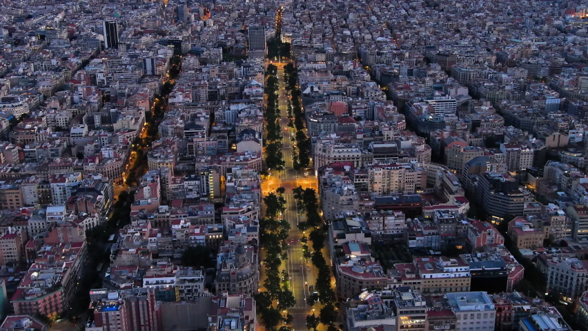 Aerial view of Passeig de Gracia major avenues in Barcelona at dusk time. Catalonia, Spain | Shutterstock HD Video #1090704301