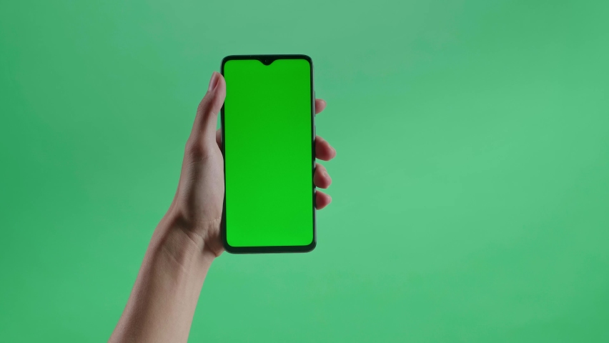Hand Tap Touch Green Screen Smartphone On The Green Screen Background
 Royalty-Free Stock Footage #1090704445
