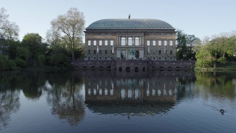 Aerial over water of historic building of modern art in Dusseldorf, Germany