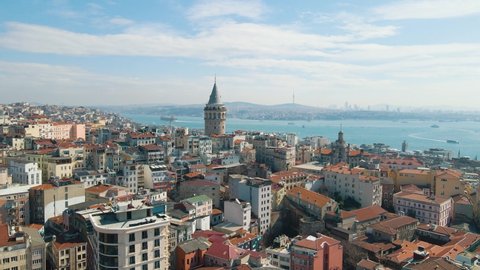Istanbul, Turkey: Aerial drone forwarding shot over Galata Tower in Istanbul. Istanbul panoramic view.