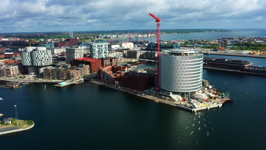 Modern architecture and cityscape at the oceanfront construction site Nordhavn in Copenhagen. This area comprises both contemporary office spaces, apartments, town houses caffe and shops. | Shutterstock HD Video #1090712769