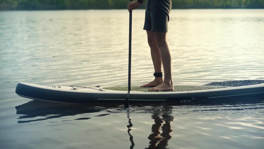 Paddleboarder Sport Sup Surfing. Recreation Paddling Sup Surfboard. Inflatable Board Rowing. Surfer Recreation Sport Watersport Activity. Water Tourism Recreation.Raft SUP. Paddler Surfing Exploration Royalty-Free Stock Footage #1090731755