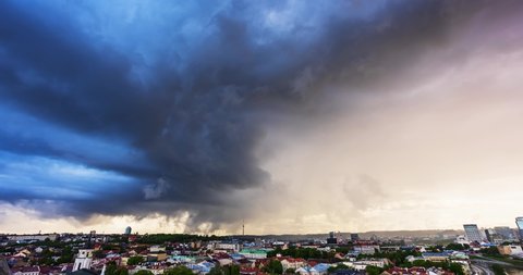 Storm spinning over the city, dramatic storm clouds, 4k timelapse movie