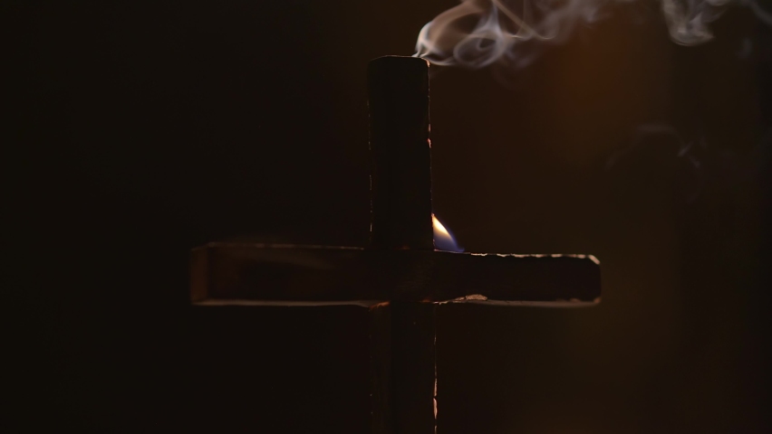 Burning cross with smoke in dark night sky Royalty-Free Stock Footage #1090758059