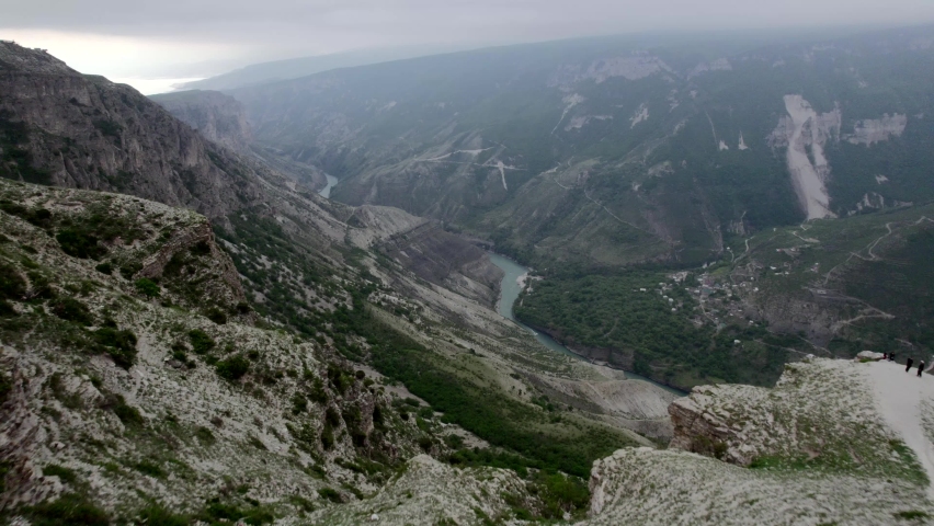 Huge deep canyon with wonderful  river rocks and forest