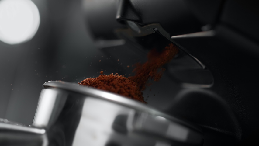 Ground Coffee Pouring out of Grinder and Falling into Portafilter in Slow Motion | Shutterstock HD Video #1090764173