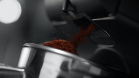 Ground Coffee Pouring out of Grinder and Falling into Portafilter in Slow Motion - Powered by Shutterstock - Get 15% off with code: PIKWIZARD15