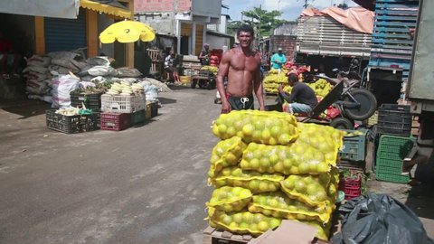 salvador, bahia, brazil - april 30, 2021: Customers shopping at Sao Joaquim fair in Salvador city.
