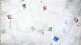 Empty plastic bottles falling down. Water PET bottle recycling plastic water bottle recyclable waste sorting. Recyclable trash recycle garbage bottles background plastic PET recycling waste processing - Powered by Shutterstock - Get 15% off with code: PIKWIZARD15