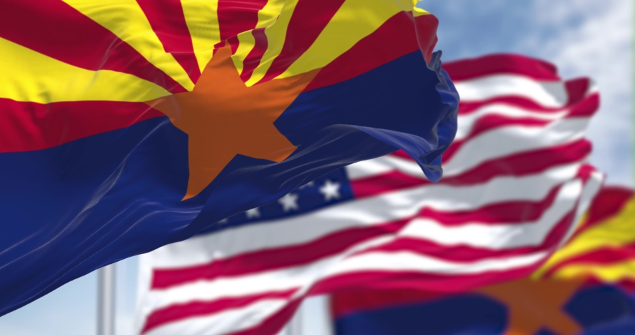 Seamless loop in slow motion with the flags of the Arizona state and United States waving in the wind. is a state in the Western United States. Democracy and independence. American state. Royalty-Free Stock Footage #1090776973