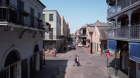 New Orleans , Louisiana , United States - 05 23 2022: Aerial View of People in French Quarter, Old Buildings, Streets and Tourist Attractions on Sunny Day