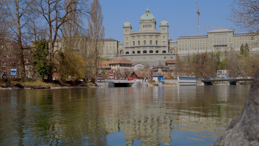 The Federal Palace is a building in Bern housing the Swiss Federal Assembly (legislature) and the Federal Council (executive) Seat of the Government - Wide shot