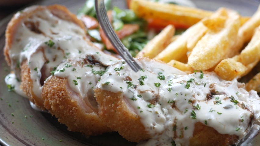  Chicken Cordon Bleu and Mayonnaise on table  Royalty-Free Stock Footage #1090790139