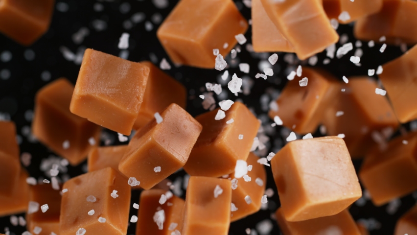 Super Slow Motion Shot of Salted Caramel Explosion Towards Camera Isolated on Black at 1000fps. | Shutterstock HD Video #1090797065