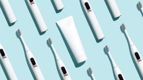 Pattern from mock up toothbrush and toothpaste on blue background - Stop motion animation - Powered by Shutterstock - Get 15% off with code: PIKWIZARD15