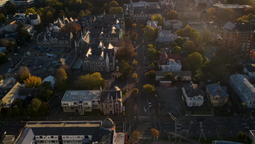 Beautiful aerial of historic buildings in Christchuch city, New Zealand. Colorful Autumn golden hour.