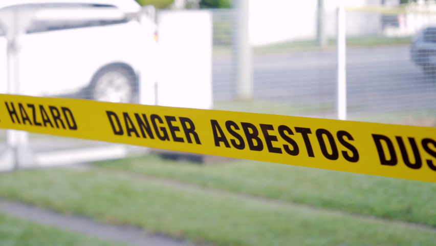 Yellow Asbestos Danger Tape on Site