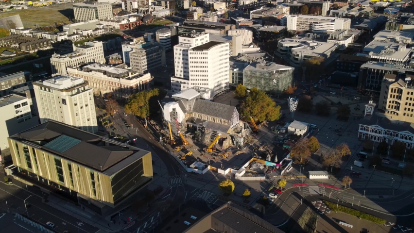 Construction of restoration of Christchurch Cathedral in city centre, demolished by earthquake. Aerial pull back