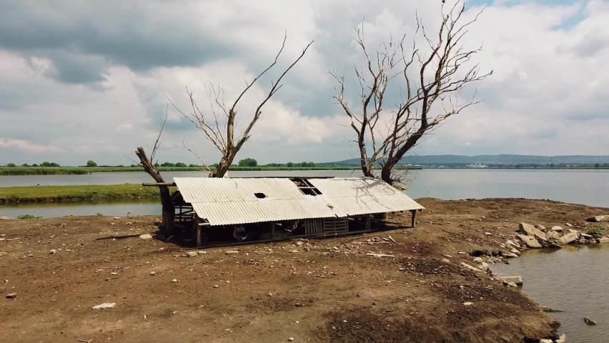Abandoned stable on an eco farm on the lake