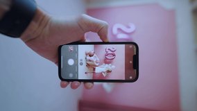 Girl posing with the number 20, birthday 20 years, twentieth anniversary, vertical video - Powered by Shutterstock - Get 15% off with code: PIKWIZARD15