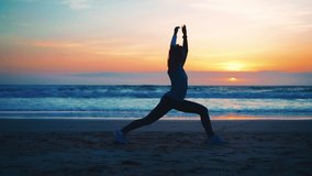 Silhouette Woman practice yoga warrior pose to meditation with summer vacation beach happiness and relaxation. Calm female exercise with yoga meditate ocean beach with sunset. Mental health.  - Powered by Shutterstock - Get 15% off with code: PIKWIZARD15