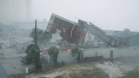 Hurricane Michael Rips Roof off House During Category 5 Storm - Powered by Shutterstock - Get 15% off with code: PIKWIZARD15