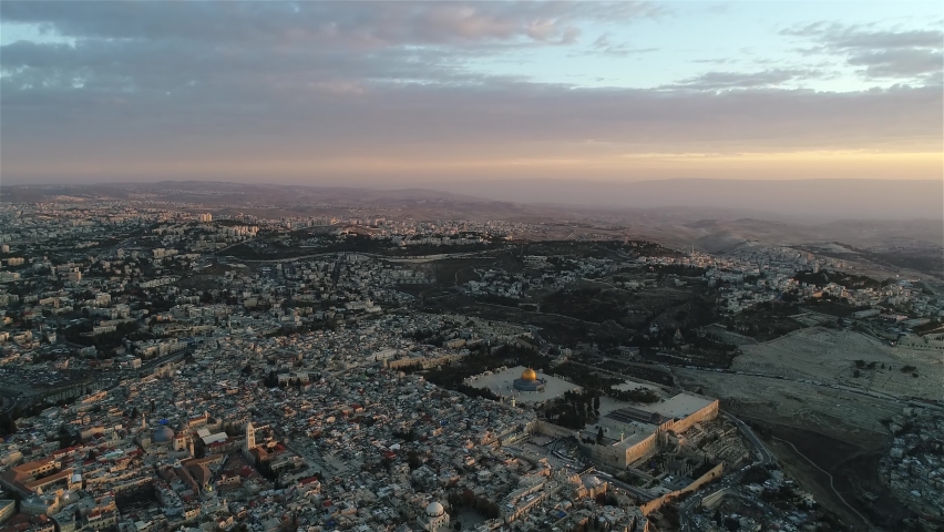 Jerusalem city aerial view with the holy places, Sunset
Drone view from east Jerusalem old city and golden dome of the rock, may 2022 at sunset, israel
 Royalty-Free Stock Footage #1090850321