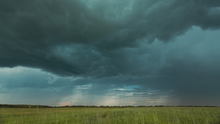 4K Sky During Rain Horizon Above Rural Wheat Landscape Field. Agricultural And Weather Forecast Concept. Storm, Thunder, thunderstorm, stormclouds, Time Lapse, Timelapse, Time-lapse. Countryside Royalty-Free Stock Footage #1090854915