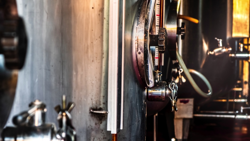 winery cellar factory - wine in silos industrial basement for wine aging cell area background. High quality 4k footage