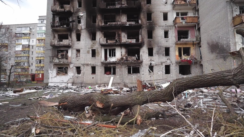  Russian invasion of Ukraine bombed building destroyed war refugees. Rocket bomb attack Russia against Ukraine war destruction building ruins people leave or fleeing war