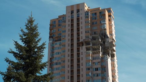 KYIV, UKRAINE, MAY 11, 2022: Russian missile damaged a multi-storey residential building in Kiev on February 26, 2022. Russian aggression. War in Ukraine. Terror and genocide of Ukrainian people