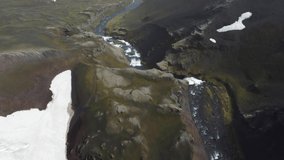 Icelandic nomanland (highlands). Man stay on top of mount in Iceland. Black desert. Aerial drone video of Icelandic landscape. Famous attractions and landmarks destinations in Icelandic nature