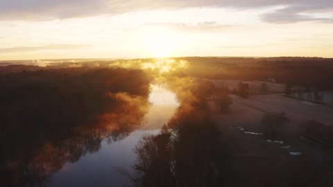 Beautiful Sunrise Aerial Through Fog on Saluda River in South Carolina